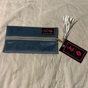 Makeup Junkie mini bag blue faux suede